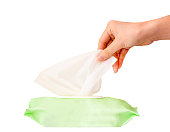 Hand picked a baby wet wipes, tissue box in package box isolated white background, with clipping path.