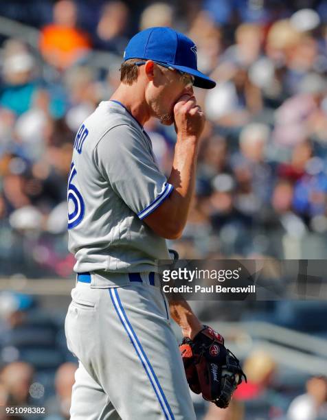 Pitcher Tyler Clippard of the Toronto Blue Jays reacts in an MLB baseball game against the New York Yankees on April 21, 2018 at Yankee Stadium in...