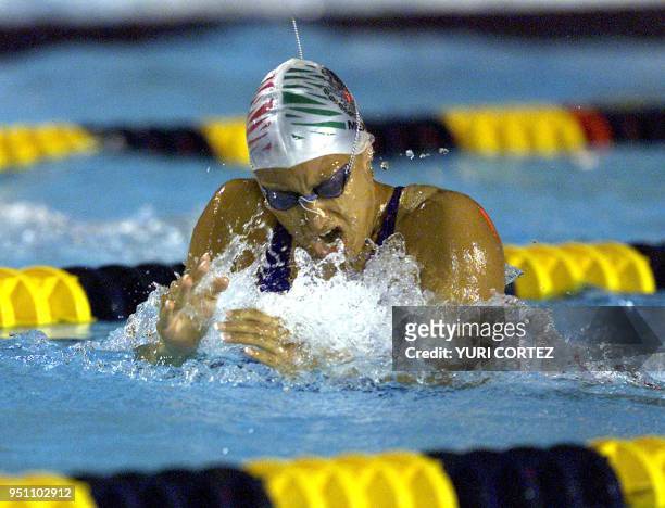 The Mexican Adriana Marmolejo competes, 28 November 2002 in the 4x100 meters combined swimming competition of the XIX Central American and Caribbean...