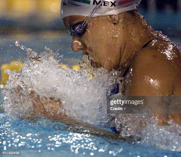 The Mexican Adriana Marmolejo competes 27 November 2002 in the 100 meter breast stroke competition during her participation in the XIX Central...