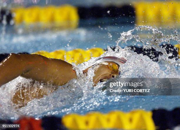 The Mexican swimmer Ivan Lopez 29 November 2002 competes in the 1500 meters freestyle simming event of the XIX Central American and Caribbean Games...