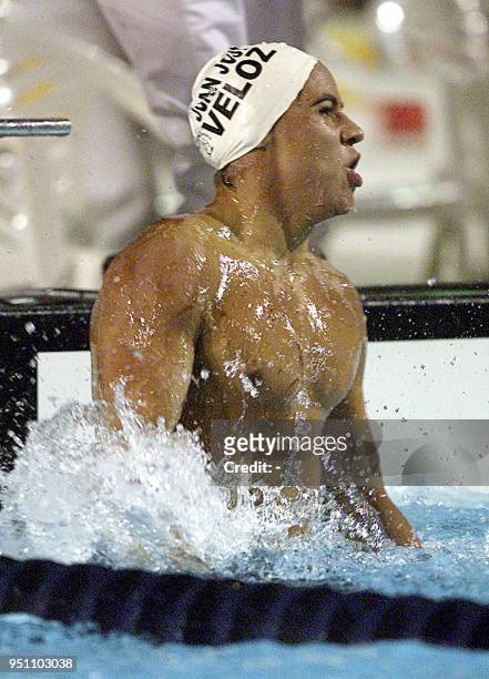 The Mexican Juan Jose Veloz celebrates, 28 November 2002, his victory in the 200 meter butterfly swimming race in the XIX Central American and...