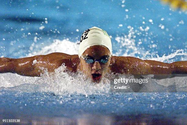 The Mexican Juan Jose Veloz compeetes, 28 November 2002, in the 200 meter butterfly swimming race in the XIX Central American and Caribbean Games El...