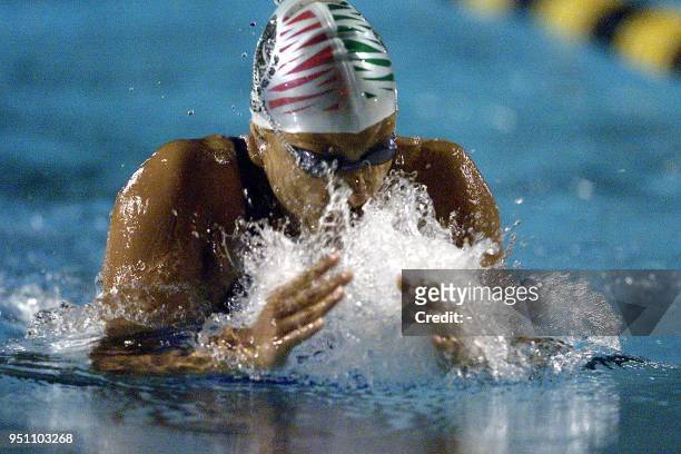 The Mexican Adriana Marmolejo competes 27 November 2002 in the 100 meter breast stroke in the XIX Central American and Caribbean Games El Salvador...