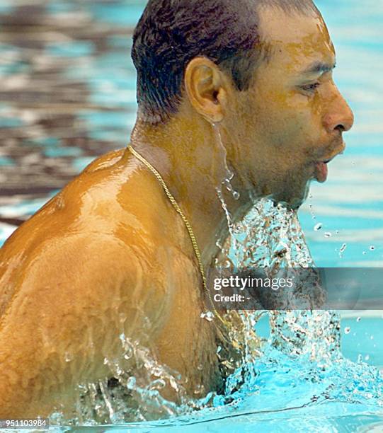 Brazilian soccer player Emerson swims in a pool, 20 July 2001, following a practice session at a country club in Cali, Colombia. Brazil, who defeated...