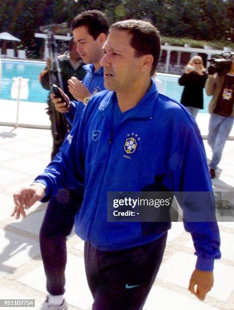 The coach of the Brazilian Soccer Selection Wanderley Luxemburgo walks by the pool in the hotel in Foz de Iguazu, Brazil, 19 July 2000. Brazil lost...