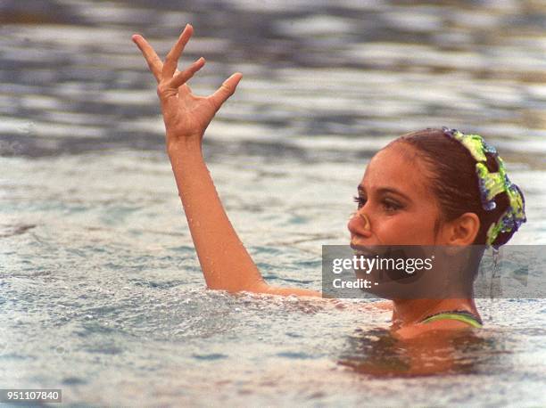 Mexican synchronized swimmer Melissa Saavedra performs a routine in the Juvenile Category A, 03 July 2000, in the Maria del Milagro Paris swimming...