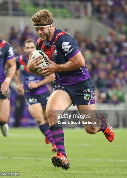 Christian Welch of the Melbourne Storm scores a try during the round eight NRL match between the Melbourne Storm and New Zealand Warriors at AAMI...
