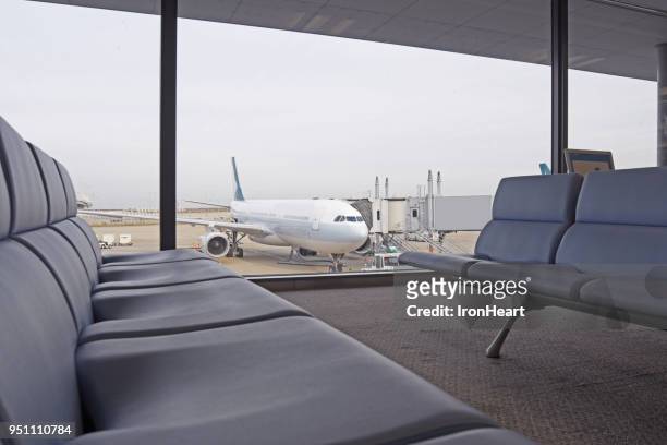 plane in the airport. - japan gate stock pictures, royalty-free photos & images
