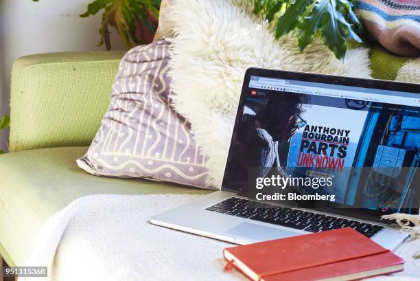 Time Warner Inc. CNN brand television series "Anthony Bourdain: Parts Unknown" is displayed on an Apple Inc. Laptop computer in this arranged...