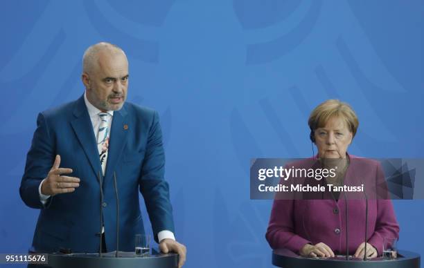 German Chancellor Angela Merkel and Albanian Prime Minister Edi Rama address the media during a press statement ahead of their meeting in the German...