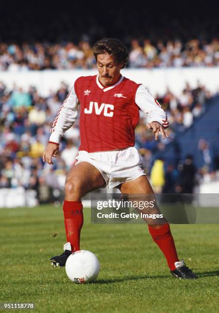 Arsenal defender Kenny Sansom pictured in action during a match against Tottenham Hotspur at White Hart Lane in October 1987 in London, England.