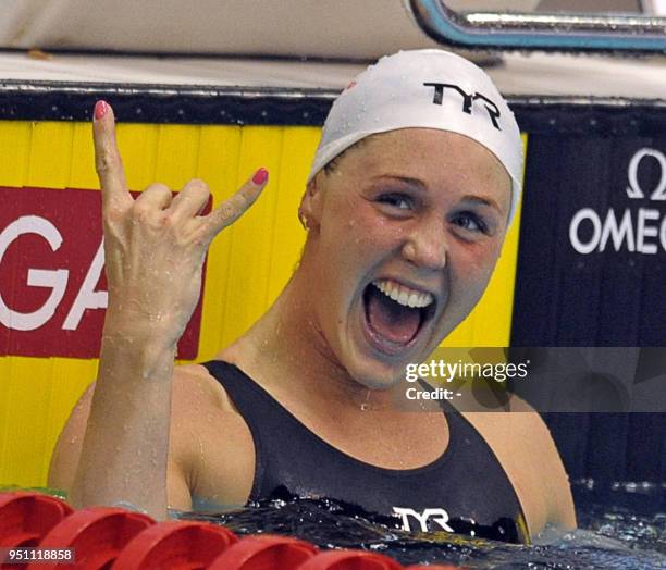 Denmark's Jeanette Ottesen reacts after winning gold medal in the women's 100m Butterfly during the European Short Course Swimming Championships in...