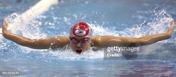 Chinese swimmer Yang Yu swims in the women's 200m butterfly final race during the FINA Swimming World Cup 2002/2003 short-course in Shanghai, 02...