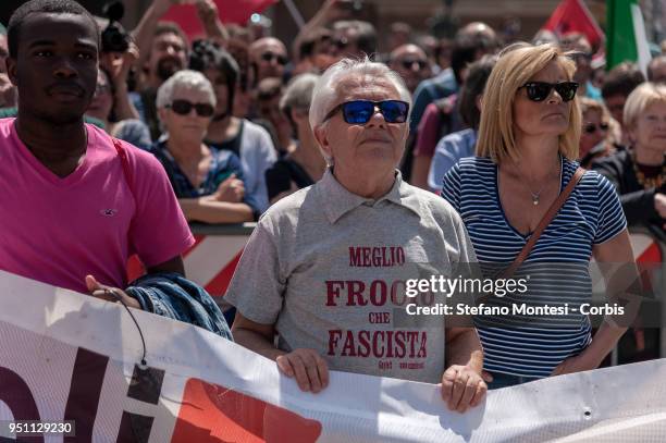 Demonstrator wears a t-shirt that says "Meglio Forcio Che Fascista" during a rally to celebrate the 73rd Liberation Day on April 25, 2018 in Rome,...