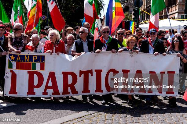 Italians carry an Associazione Nazionale Partigiani d'Italia banner saying "The Partisan" during a rally to celebrate the 73rd Liberation Day on...
