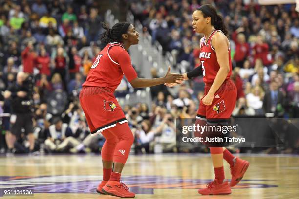 Asia Durr and Asia Durr of the Louisville Cardinals react to a play during the semifinal game of the 2018 NCAA Photos via Getty Images Division I...