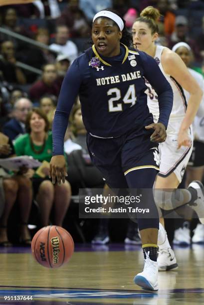 Arike Ogunbowale of the Notre Dame Fighting Irish dribbles down court during the semifinal game of the 2018 NCAA Photos via Getty Images Division I...