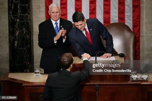 French President Emmanuel Macron is greeted by U.S. Vice President Mike Pence and Speaker of the House Paul Ryan before Macron addresses a joint...