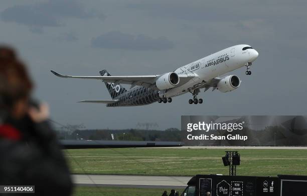 An Airbus A350-900 passenger plane flies at the ILA Berlin Air Show on April 25, 2018 in Schoenefeld, Germany. ILA Berlin is Europe's third largest...