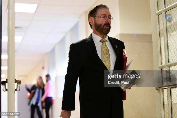 Montgomery County Judge Steven O'Neill walks towards courtroom A for the Bill Cosby sexual assault trial at the Montgomery County Courthouse, on...