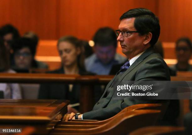 District Court Judge Thomas Estes listens as his attorney addresses the court as arguments are made in front of the five justices of the Supreme...