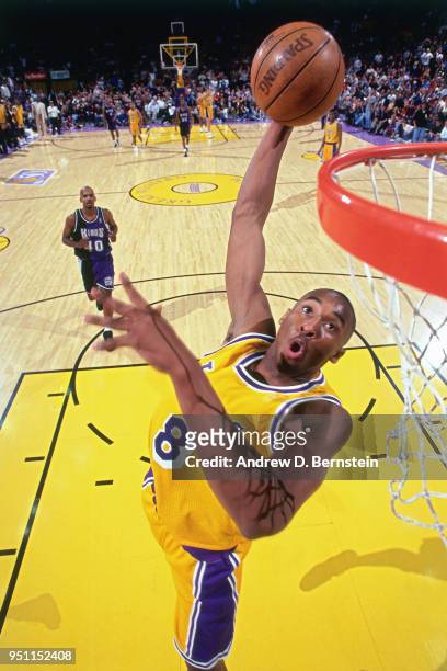 Kobe Bryant of the Los Angeles Lakers dunks the ball against the Sacramento Kings on January 3, 1997 at the Great Western Forum in Inglewood,...