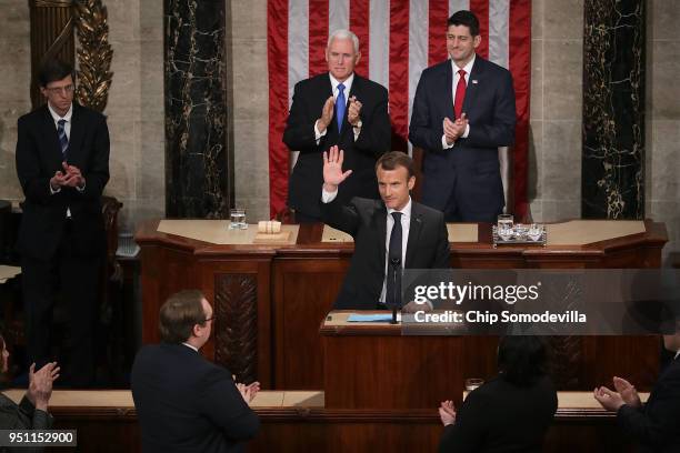 French President Emmanuel Macron acknowledges applause at the conclusion of his address to a joint meeting of the U.S. Congress with Speaker of the...