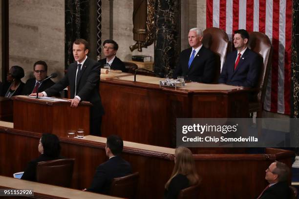 Speaker of the House Paul Ryan and U.S. Vice President Mike Pence do not applaud after French President Emmanuel Macron said he believed the United...