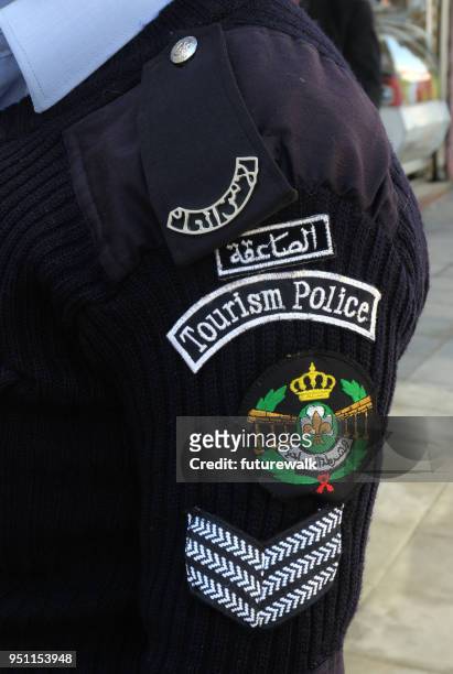 jordan tourism police uniform shoulder patch - amman stock pictures, royalty-free photos & images