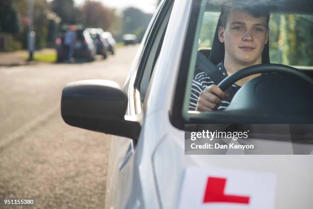 young driver with l plate - learning to drive stock pictures, royalty-free photos & images