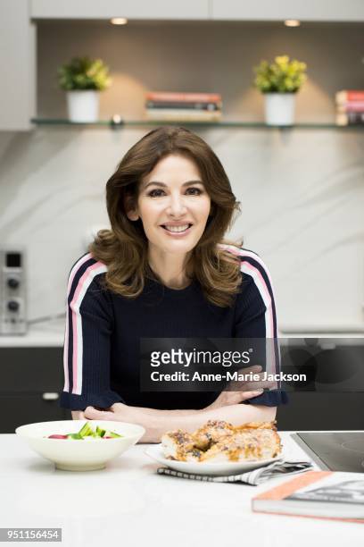 Nigella Lawson in the test kitchen with Karon Liu, the Toronto Star's resident food writer, making sesame roasted chicken from her new cookbook At My...