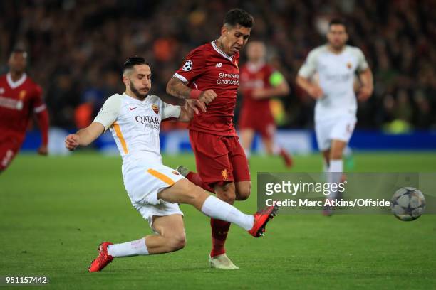 Kostas Manolas of A.S.Roma in action with Roberto Firmino of Liverpool during the UEFA Champions League Semi Final First Leg match between Liverpool...