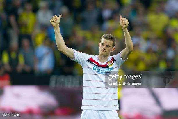 Sven Bender of Bayer Leverkusen applauds to the supporters of Dortmund after the Bundesliga match between Borussia Dortmund and Bayer 04 Leverkusen...
