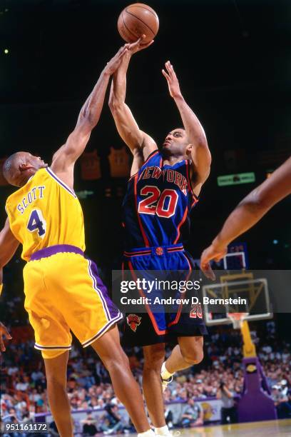 Allan Houston of the New York Knicks shoots the ball against the Los Angeles Lakers on February 23, 1997 at the Great Western Forum in Inglewood,...