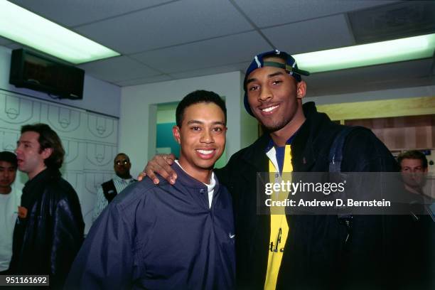 Tiger Woods and Kobe Bryant of the Los Angeles Lakers pose for a photo circa 1997 at the Great Western Forum in Inglewood, California. NOTE TO USER:...