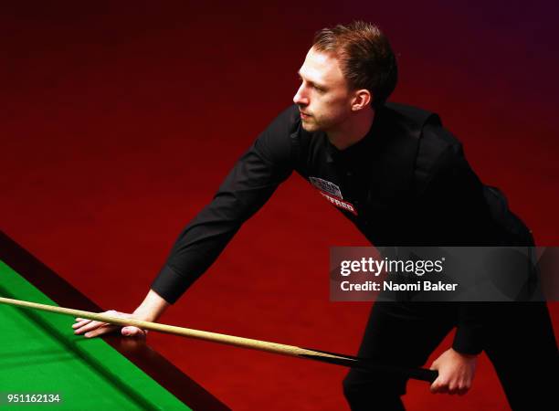 Judd Trump of England reacts during his first round match against Chris Wakelin of England during day five of the World Snooker Championship at...