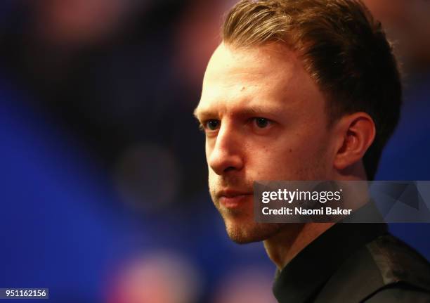 Judd Trump of England looks on during his first round match against Chris Wakelin of England during day five of the World Snooker Championship at...