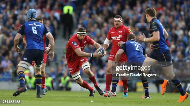 Lewis Rawlins of the Scarlets charges upfield during the European Rugby Champions Cup Semi-Final match between Leinster Rugby and Scarlets at Aviva...
