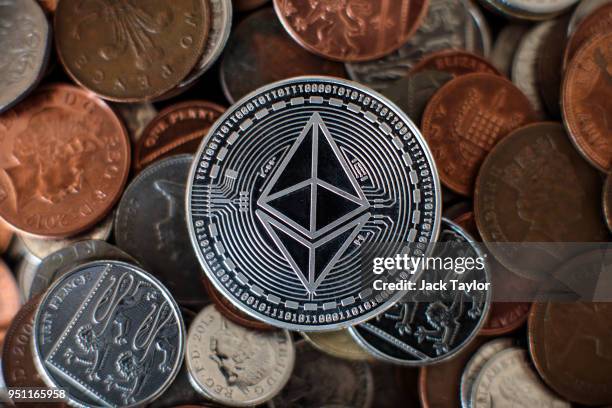In this photo illustration of the ethereum cryptocurrency 'altcoin' sits arranged for a photograph on April 25, 2018 in London, England....