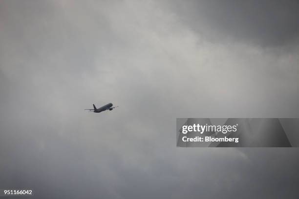 An American Airlines Group Inc. Plane takes off at Dallas-Fort Worth International Airport in Grapevine, Texas, U.S., on Friday, April 6, 2018....