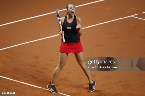 Anett Kontaveit of Estonia celebrates after defeating Kristina Mladenovic of France during day 3 of the Porsche Tennis Grand Prix at Porsche-Arena on...