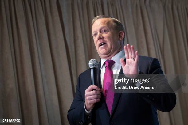 Former White House Press Secretary Sean Spicer answers a few questions from the press at Madame Tussauds wax museum, April 25, 2018 in New York City....