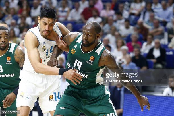 Gustavo Ayon, #14 of Real Madrid competes with James Gist during the Turkish Airlines Euroleague Play Offs Game 3 between Real Madrid v Panathinaikos...