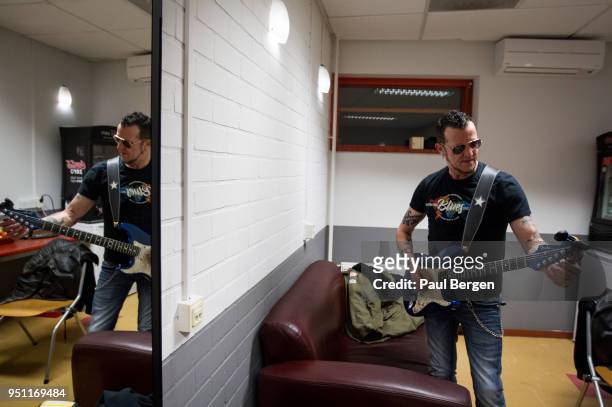 American blues guitarist Gary Hoey warms up backstage in his dressing room at The Boerderij, Zoetermeer, Netherlands, 16th March 2018.