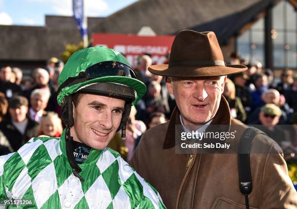 Naas , Ireland - 25 April 2018; Jockey Richie Deegan, left, and trainer Willie Mullins, right, after winning the Racing Post Champions INH Flat Race...