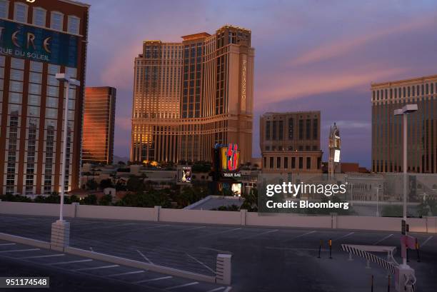 The Las Vegas Sands Corp. Palazzo resort stands illuminated at dusk in Las Vegas, Nevada, U.S., on Tuesday, April 24, 2018. An agreement by Japanese...