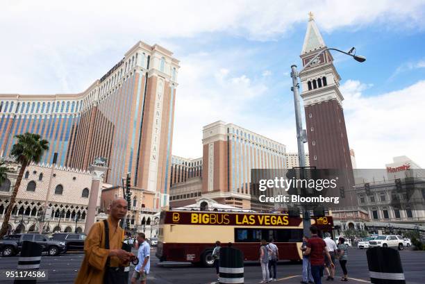 Pedestrians pass in front of the Las Vegas Sands Corp. Venetian resort in Las Vegas, Nevada, U.S., on Tuesday, April 24, 2018. An agreement by...