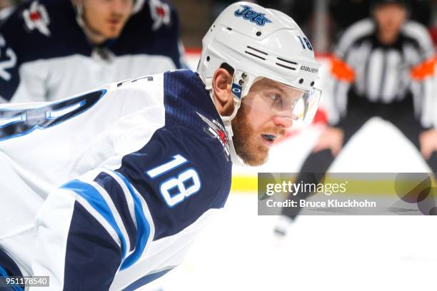 Bryan Little of the Winnipeg Jets awaits a faceoff against the Minnesota Wild in Game Four of the Western Conference First Round during the 2018 NHL...