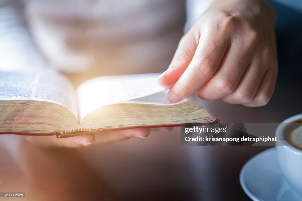 Women reading holy bible.